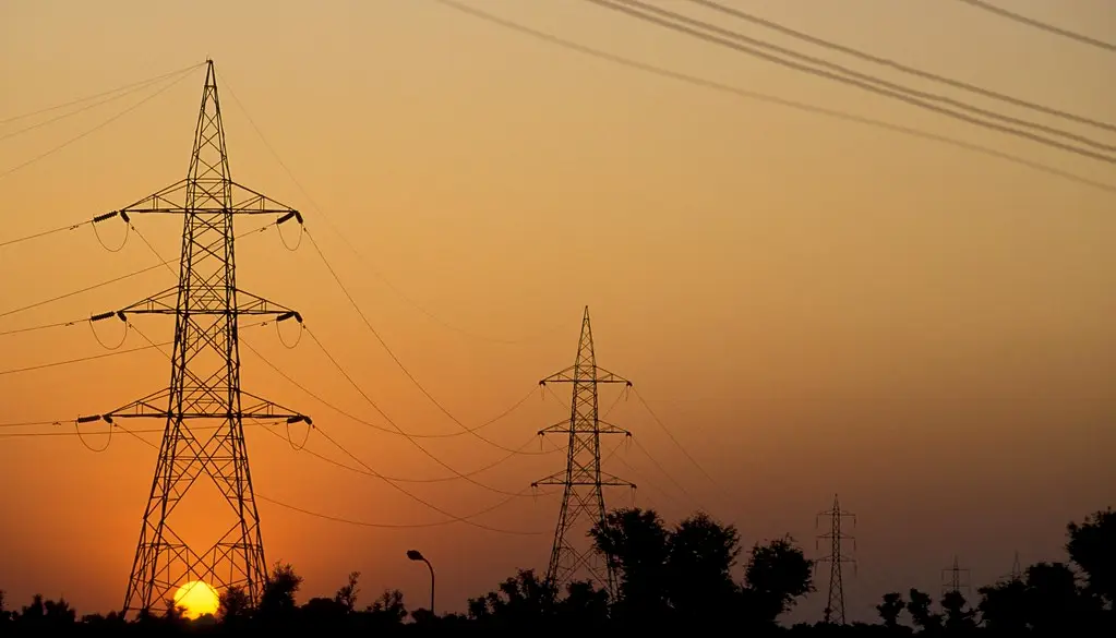 High-voltage power lines feeding a large data center campus