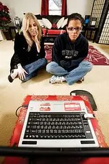A player gaming on a thin laptop streaming from the cloud