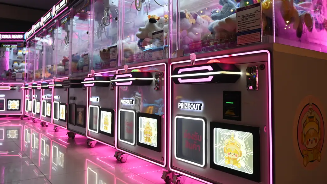 A game controller lit by neon lighting, evoking the GTA aesthetic