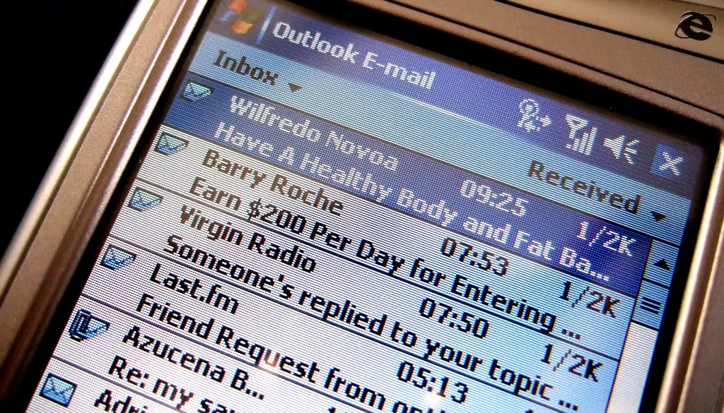 A person reviewing automated work output on a laptop in an office